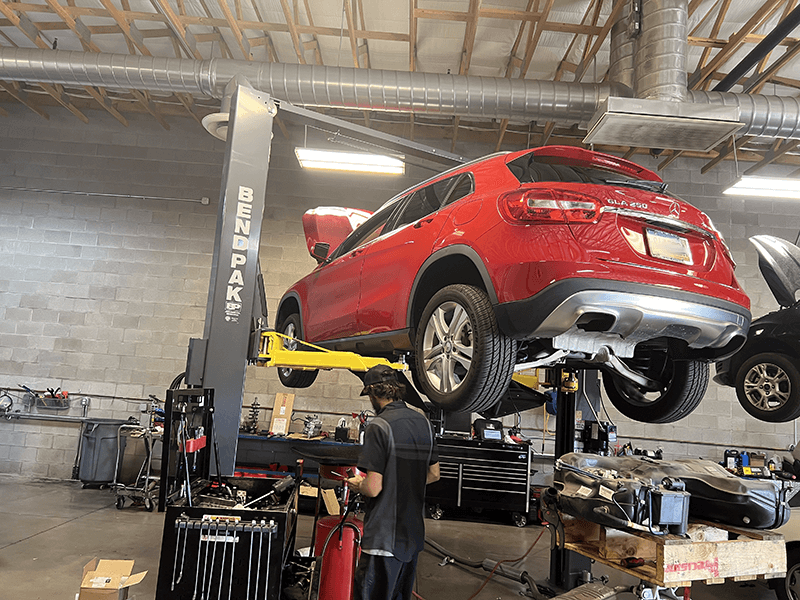 Mercedes on the lift at Auto Care Experts in Gilbert, AZ